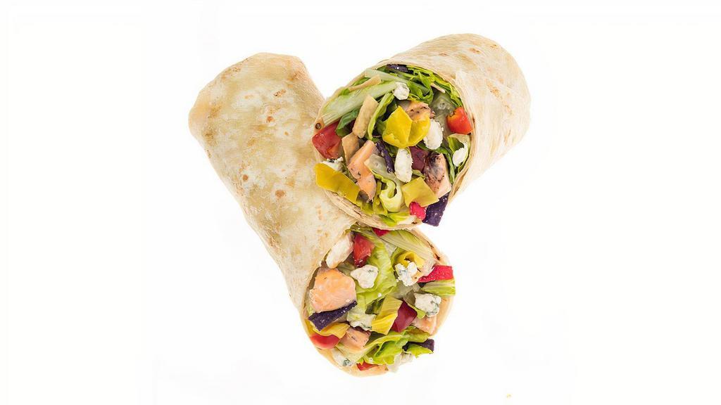 Buffalo Bleu Wrap · Starting with a flour tortilla, our Chef recommends a base of our Romaine/Iceberg Blend. It's served with Grilled Buffalo Chicken, Diced Tomatoes, Sliced Banana Peppers, Bleu Cheese and Tri-Color Tortilla Strips. We recommend our Creamy Bleu Cheese dressing.
