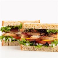 West Coast Turkey Sandwich · Roasted turkey, provolone cheese, spring mix, tomatoes, and pesto spread. Served on your cho...
