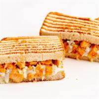 Buffalo Chicken Panini · Chicken, provolone cheese, and spicy buffalo sauce with blue cheese dressing. Served on gril...
