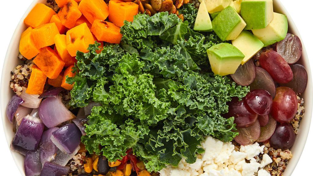 Southwest Grain Bowl · Quinoa, kale, roasted butternut squash, corn bean blend, avocado, grapes, roasted onions, feta cheese.  Recommended dressing:  Chipotle Ranch
