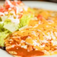 Enchiladas (2) · Choice: cheese, chicken, beef or grilled veggies covered in red or green sauce and melted ch...