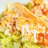 Classic Taco · Hard shell-corn tortilla. Your choice filling.   Topped with lettuce, tomato and cheese.