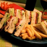 Traditional Clubhouse · Fresh turkey, bacon, lettuce and tomato with mayonnaise on toasted sourdough.