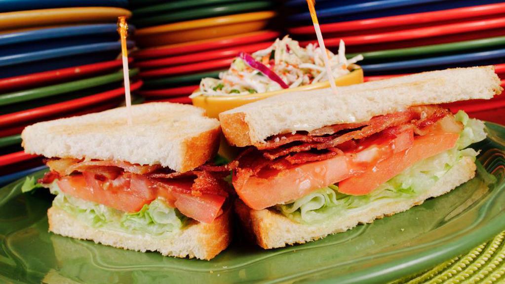 Legends Blt · Strips of bacon, lettuce, tomato and mayonnaise on toasted sourdough.