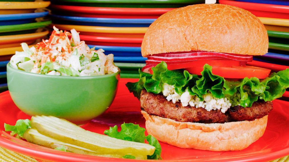 Bleu Cheese Burger (1/2 Lb.) · With Bleu cheese crumbles, tomato, lettuce and red onion served on a brioche bun.