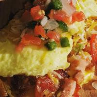 The Shacks Omelet · Two egg omelet with bacon, ham, grilled bell pepper and onion topped with salsa and mixed ch...