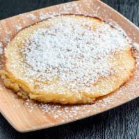 Pancakes · Buttery pancakes topped with powder sugar.
