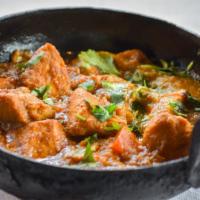 Chicken Tikka Masala (A La Carte) · Tandoori baked chicken with a special blend of spices.