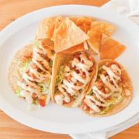 Shrimp Tacos Trio · Lettuce, pineapple sauce, chipotle ranch.