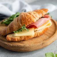 Ham & Cheese On Croissant · Breakfast sandwich croissant made with ham and creamy cheese.