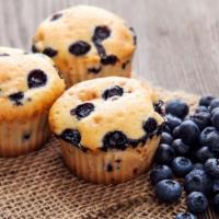 Blueberry Crumb Muffin · Moist, cupcake, loaded with blueberries and topped with a cinnamon crumble topping.