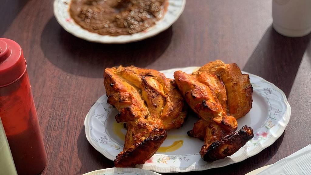 Murgh Tikka Lahori (Wholesome Chicken Leg) · Halal. Wholesome chicken leg portion lightly marinated in spices and lemon juice.