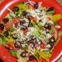 Greek Salad Large · Mixed lettuce, tomatoes, black olives, bell pepper, onions, pepperoncini, feta cheese and It...