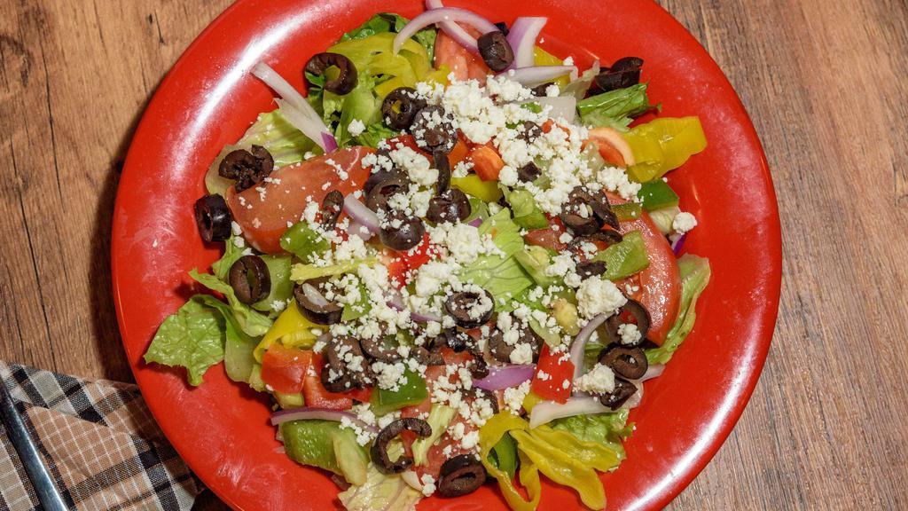 Greek Salad Large · Mixed lettuce, tomatoes, black olives, bell pepper, onions, pepperoncini, feta cheese and Italian vinaigrette dressing.