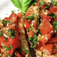 Bruschetta · Toasted bread with fresh tomatoes, basil, garlic and extra virgin olive oil.