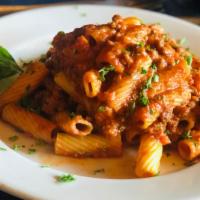 Rigatoni Bolognese · Rigatoni with our delicious bolognese including ground beef, zucchini, carrot, basil in ligh...