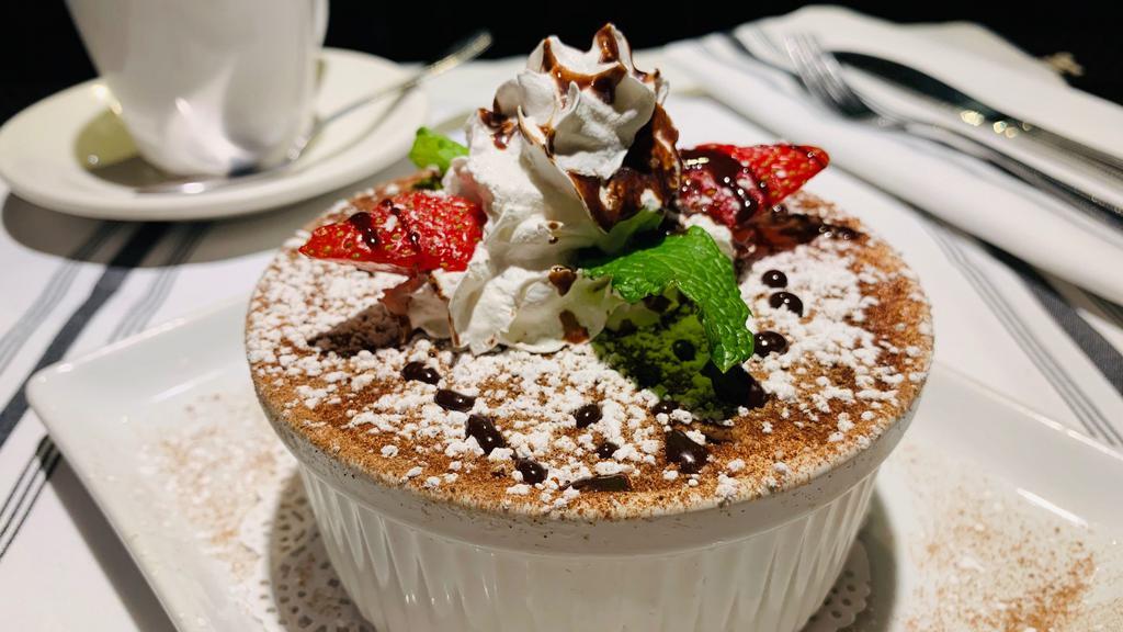 Tiramisu · The classic Italian dessert.  A layers of mascarpone cream set atop ladyfingers soaked in espresso.