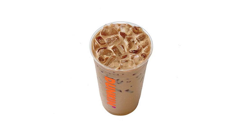 Iced Chai Latte · A sweetened blend of chai spices, including cinnamon, cardamom and nutmeg, combined with milk.