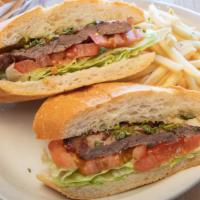 Lomito Sandwich · Grilled thinly cut certified angus beef skirt steak with lettuce, tomato & Argentine sauce.