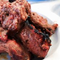 Behari Kabob · Tender chunks of marinated beef, smothered with our special exotic, spices and cooked over a...
