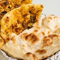 Tandoori Naan · Oven baked flatbread.