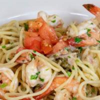 Spaghetti Scampi · Sautéed shrimp, garlic, shallots, capers and lemon wine butter sauce.