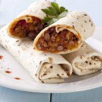 Al Pastor Burrito · Juicy, flame grilled pork marinated in an aromatic, traditional adobo. Wrapped in a soft flo...