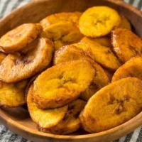Sweet Plantains · Sweet, ripe plantains fried until golden and crisp on the outside.