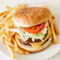 Hamburguesa Con Queso Y Papas Fritas · Cheese burger with French fries.