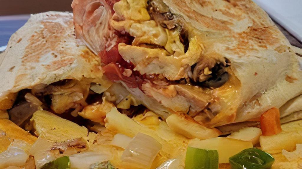 Breakfast Burrito · Large tortilla stuffed with eggs, salsa, jalapeños, cheese, and your choice of ham, bacon, or sausage.