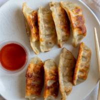 Mandu Tuigim (Panfry Dumpling 군만두 · Fried dumpling.