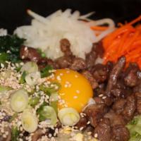 Bi Bim Bop 비빔밥 · Assorted vegetables with beef, egg. Serves with rice and house soup.