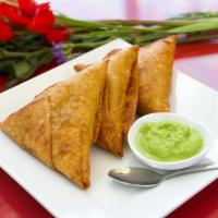 Lentil Samosa · (Vegan) Pastry shall filled with whole spicy lentils with onion and garlic.