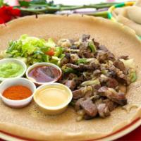 In-N-Out Tibes (Cooked Or Raw) · Cubed, tender beef sautéed or mixed with jalapeño, onion, spices, and spiced butter