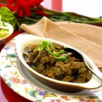 Lamb Alicha · Freshly made lamb stew seasoned with chili peppers, garlic, ginger, onions and clarified but...