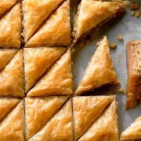 Baklava · A rich, sweet dessert pastry made of layers of filo filled with chopped nuts then sweetened ...