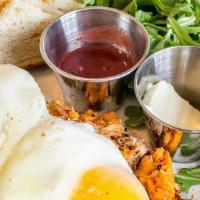 Pulled Pork Sweet Potato Hash · Pulled Pork, Sweet Potato, Red Onion, Two Sunny-Side-Up Eggs, Jalapeño Hollandaise, served w...