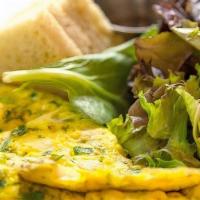 Herb Omelette · Three-Egg Mixed Herb Omelette, served with Toast and Organic Mixed Greens with Sweet Chili B...