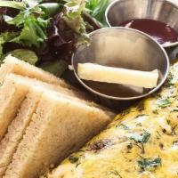 Smoked Salmon Omelette · Three-Egg Mixed Herb Omelette filled with Smoked Salmon & Cream Cheese, served with Toast an...