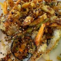 Tempura Vegetable Roll  · eggplant, carrot, zucchini, yam, green beans, squash skin, drizzled with eel sauce.