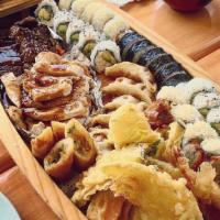 Kitchen Boat · Chicken and beef teriyaki, shrimp, and vegetable tempura, mixed dumpling, crunch roll, Calif...