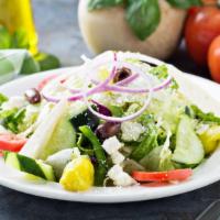 House Salad · Crisp fresh romaine or iceberg lettuce topped with ripe tomatoes, red onions, black olives a...