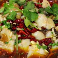 Szechuan Fish Filet In Hot Chili Oil · (四川水煮鱼）Spicy. Comes with 1 order of white rice.