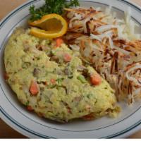 Veggie Omelet · Sautéed onions, mushrooms, carrots, and broccoli with our tomatillo salsa on the side.