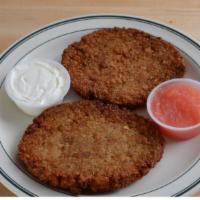 Potato Latkes · Handcrafted potato pancake lightly fried to a deep golden brown. Served with sour cream and ...
