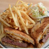 Patty Melt · 1/2 lb. burger patty with melted cheddar cheese, and grilled onions on grilled marble rye br...