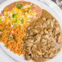 Chile Verde · Pork chunks. Topped with green sauce. Served with beans, rice and tortillas.