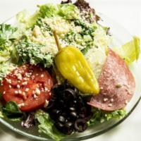Dinner Salad · Mixed greens, tomato,Kalamata olives, salami and cheese.  Served with our homemade Creamy It...