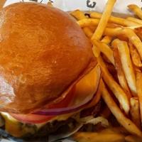 Cheese Burger · Potato bun, beef patty, American cheese, rock-n-sauce, small fries.
