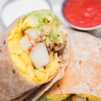 Breakfast Burrito · Organic scrambled eggs, nitrate hormone-free turkey bacon, roasted potatoes, cotija cheese, ...